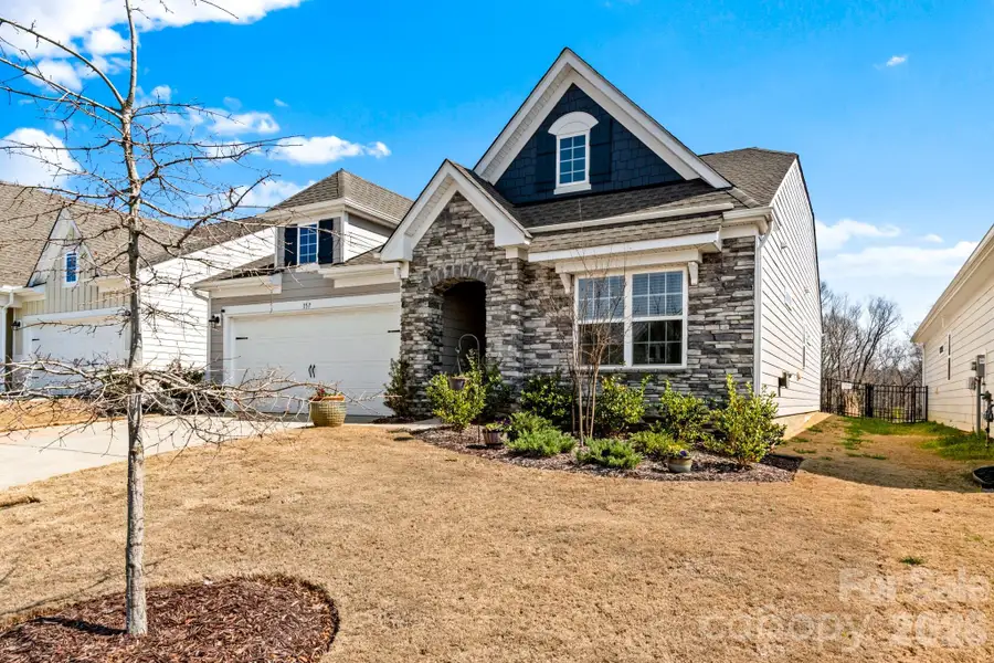 Front exterior of a new home in Bell Farm, Statesville, NC, highlighting curb appeal (Image 24).