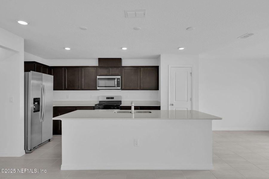 Furnished interior view inside a new home in Wells Landing, Jacksonville (Image 5). Furnished interior view inside a new home in Wells Landing, Jacksonville (Image 5).