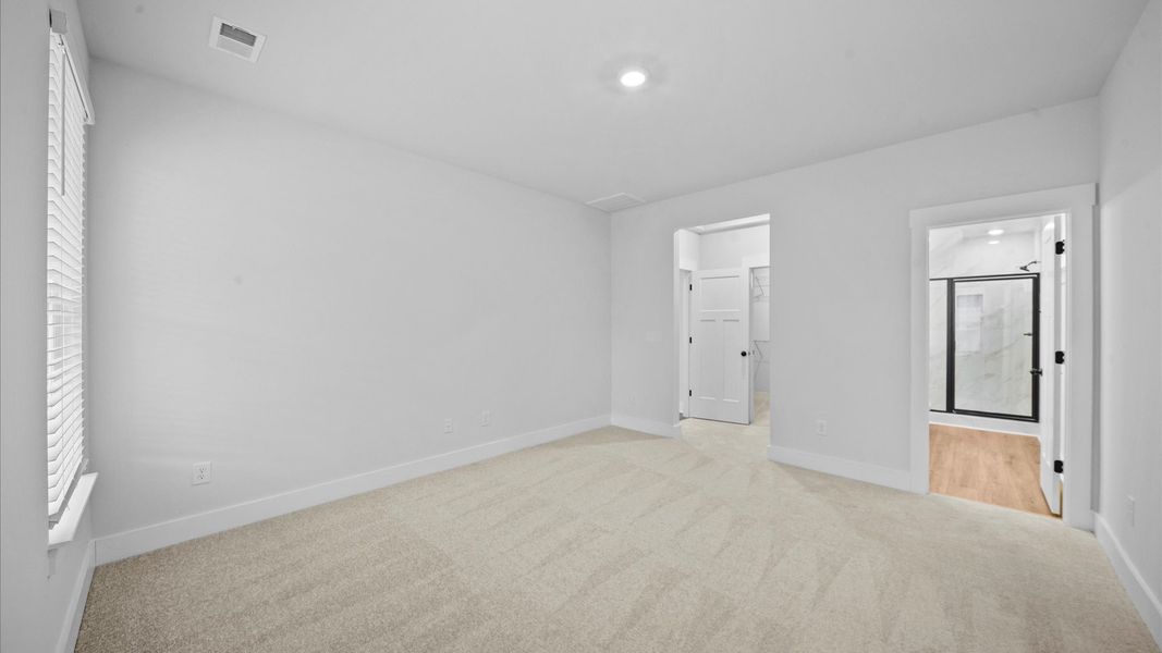 Accomplished design meets restful elegance in this exclusive primary suite by DRB Homes Accomplished design meets restful elegance in this exclusive primary suite by DRB Homes