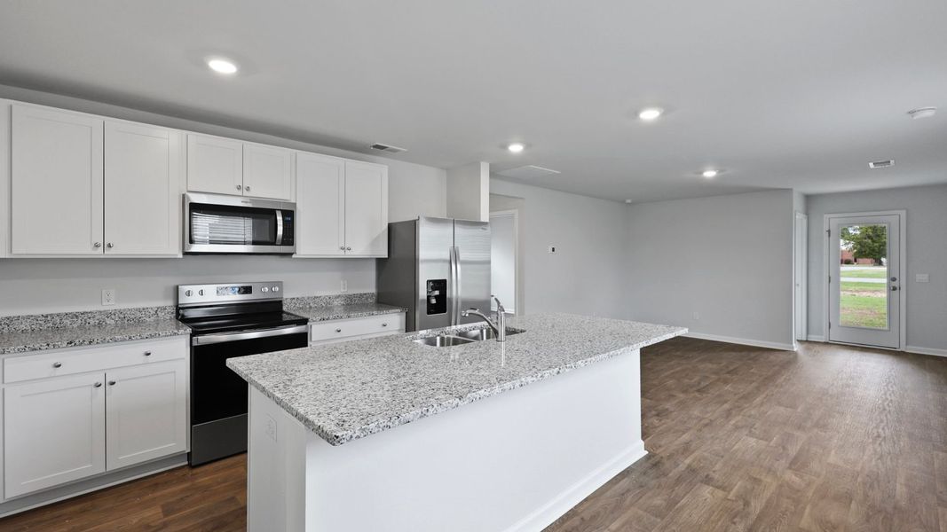 Representative furnished interior of a home built from the DOWNING by D.R. Horton in Evergreen, Holly Hill (Image 4).