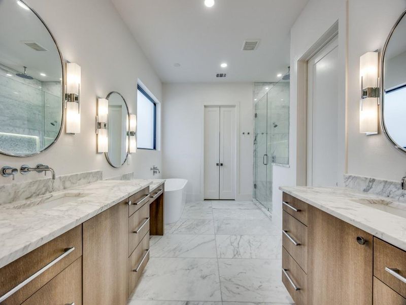 Bathroom with shower with separate bathtub and vanity