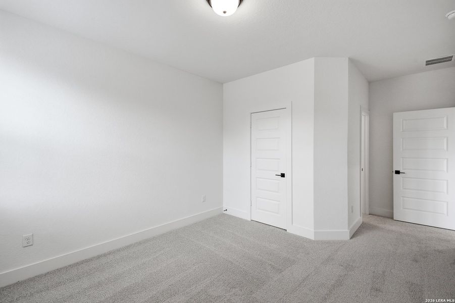 Spacious, unfurnished interior of a new home in The Reserve at Potranco Oaks, Castroville (Image 40).