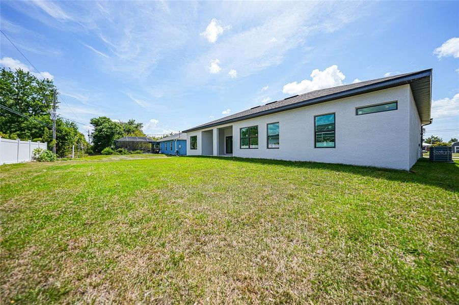 Exterior details and patio area of a home in , Englewood (Image 33).