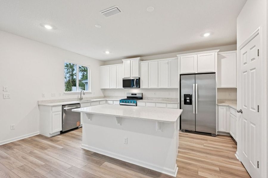 Furnished interior view inside a new home in Whiteview Village, Palm Coast (Image 5).