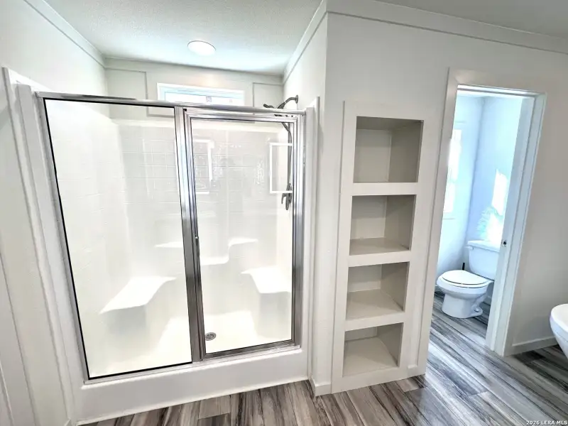 Furnished interior view inside a new home in , Lakehills (Image 10).