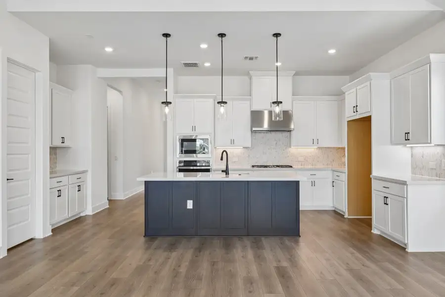Representative furnished interior of a home built from the Guadalupe by Taylor Morrison in Eastwood, Manor (Image 5).