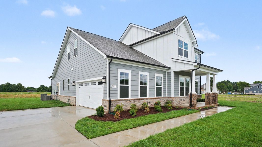 Exterior of an Elate II plan with a side entry garage built at Northridge Park in Murfreesboro, TN Exterior of an Elate II plan with a side entry garage built at Northridge Park in Murfreesboro, TN