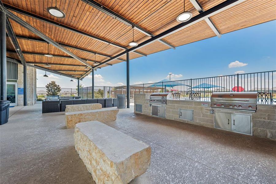 View of patio featuring area for grilling and an outdoor living space View of patio featuring area for grilling and an outdoor living space