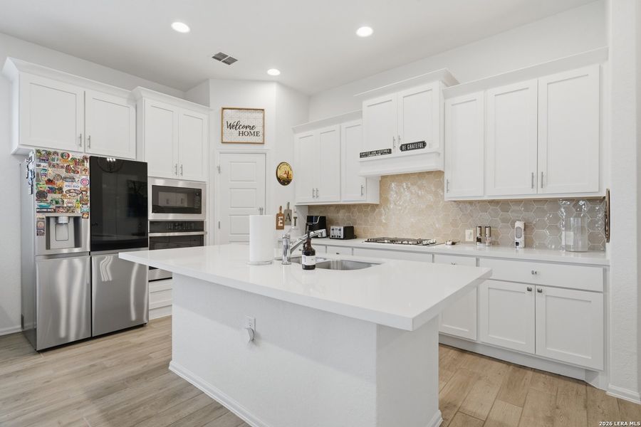 Furnished interior view inside a new home in Ladera, San Antonio (Image 14).