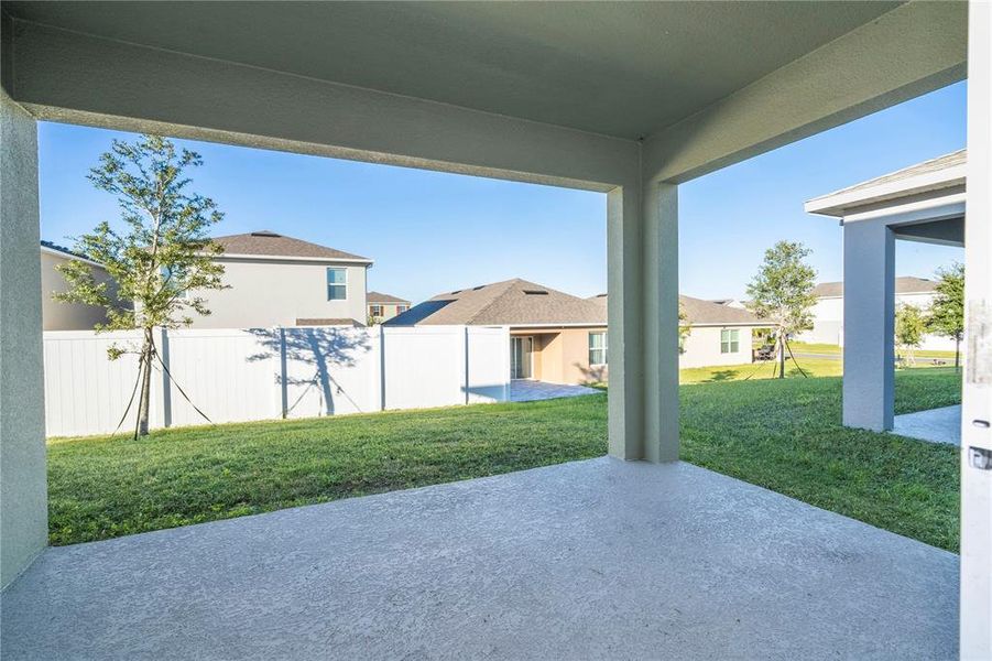 Exterior details and patio area of a home in Astonia, Davenport (Image 27).