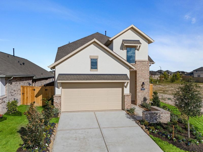 Front exterior of a new home in Bridgeland, Cypress, TX, highlighting curb appeal (Image 22).