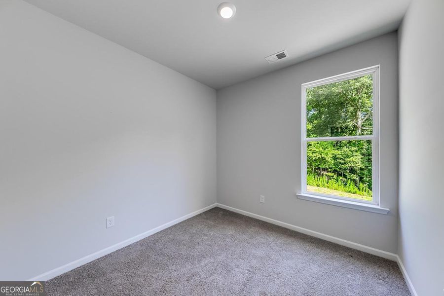 Spacious, unfurnished interior of a new home in Chimney Oaks Townhomes, Homer (Image 24).