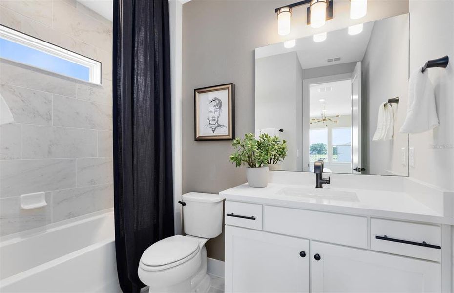 Furnished interior view inside a new home in Parkside Trails, Clermont (Image 34).