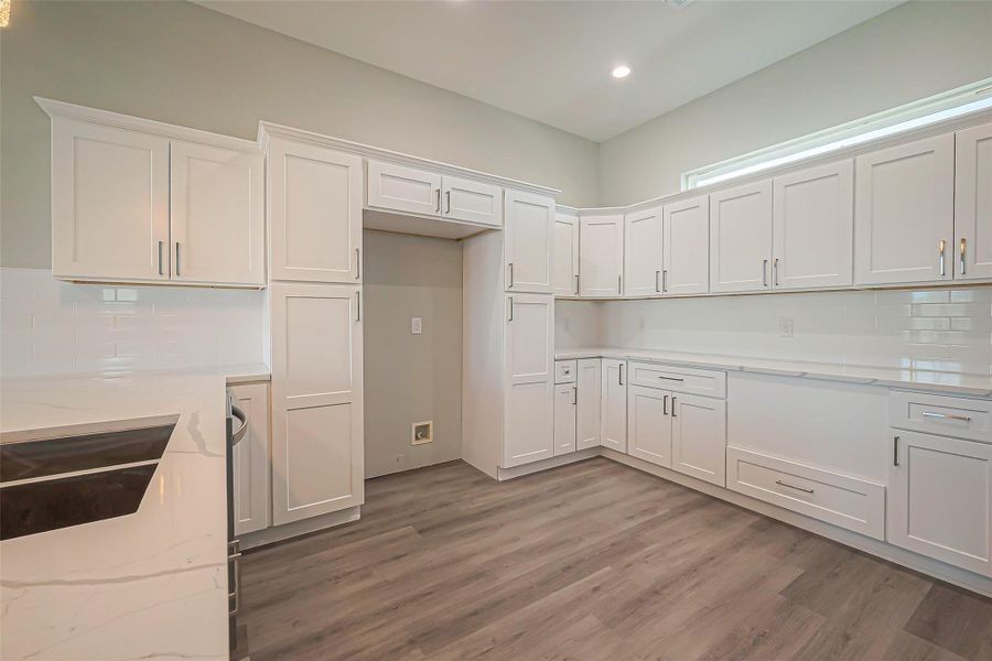 Clean and inviting open kitchen.