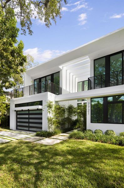 Front exterior of a new home in , South Miami, FL, highlighting curb appeal (Image 27).