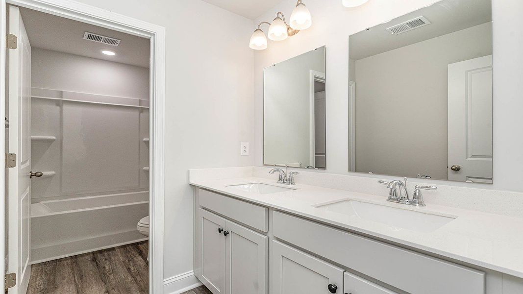 Furnished interior view inside a new home in Auberon Woods, Conway (Image 9).