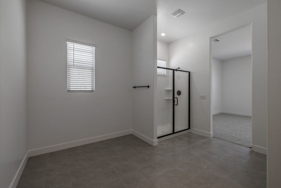 Representative unfurnished interior of a home built from the Ponderosa by William Ryan Homes in Silver Cross, San Tan Valley (Image 24).