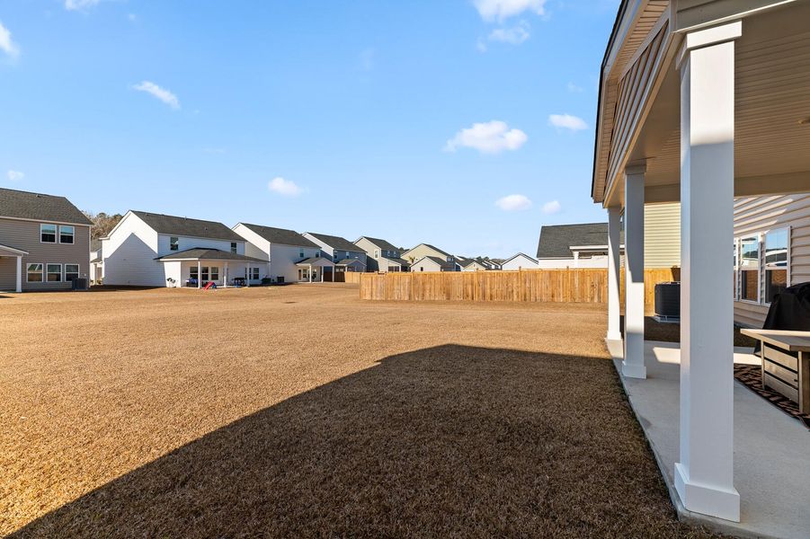 Exterior details and patio area of a home in Heron's Walk at Summers Corner, Summerville (Image 26).