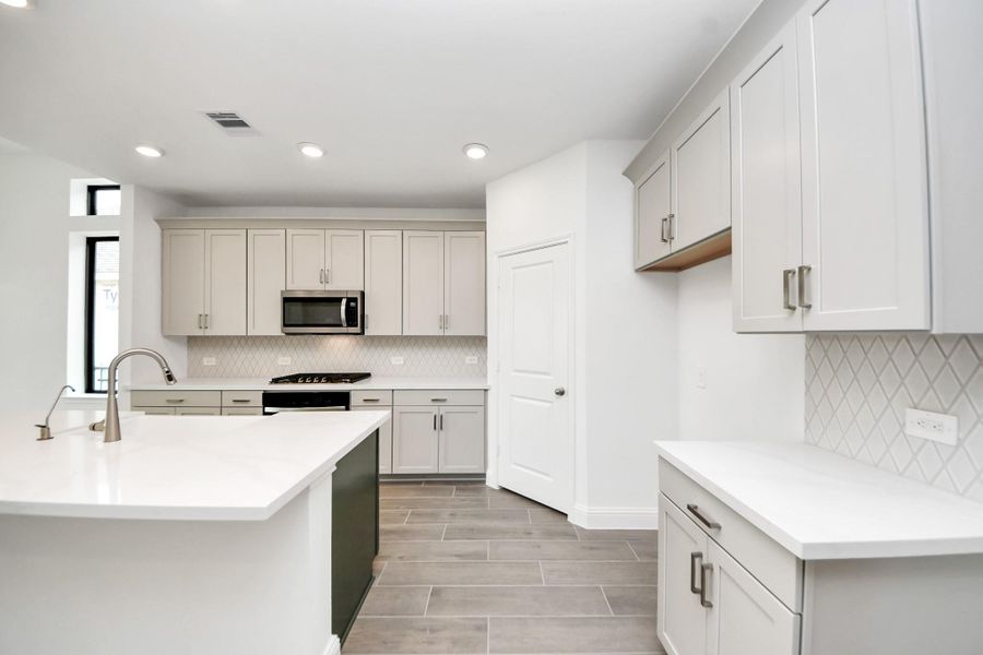 Furnished interior view inside a new home in Gatherings® at Chambers Creek: Duets Collection, Willis (Image 6). Furnished interior view inside a new home in Gatherings® at Chambers Creek: Duets Collection, Willis (Image 6).