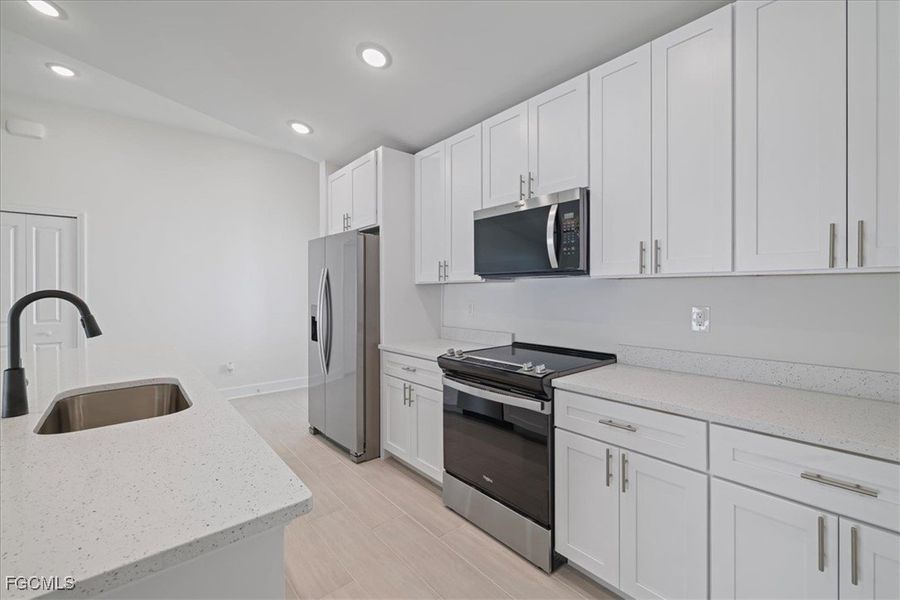 Furnished interior view inside a new home in Cape Coral, Cape Coral (Image 9).