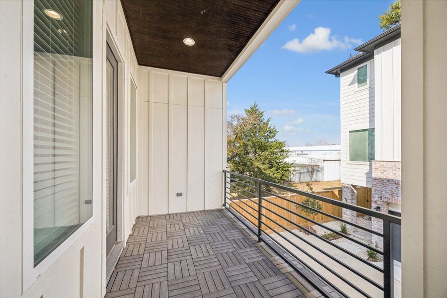 An oversized balcony provides plenty of room for dining or lounging, inviting you to unwind and enjoy the outdoors.