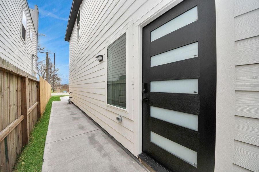 Exterior details and patio area of a home in , Houston (Image 3).