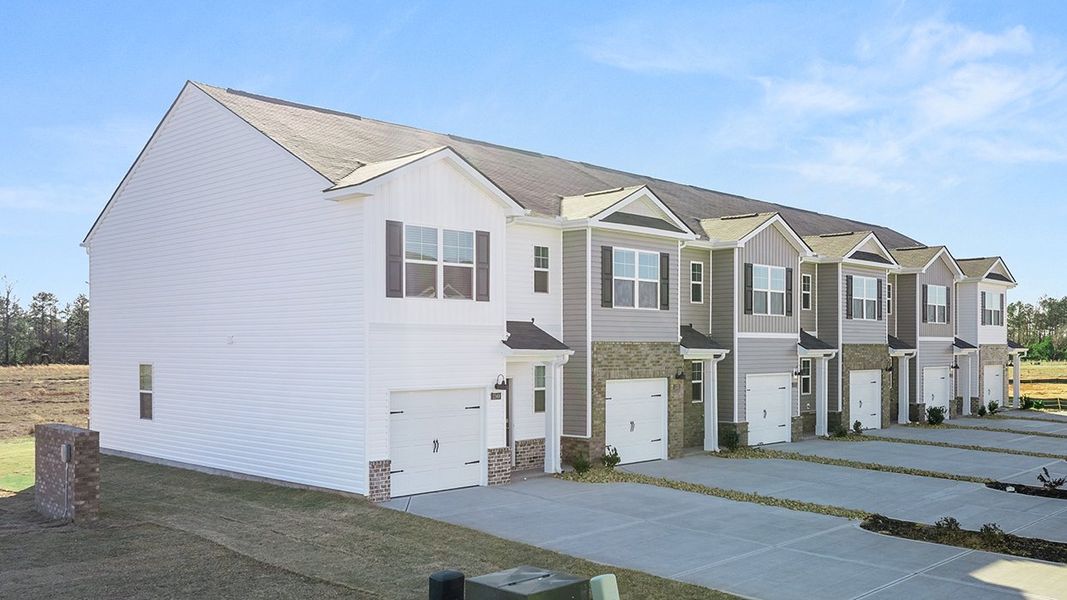 Front exterior of a new home in Weatherstone, Grovetown, GA, highlighting curb appeal (Image 2). Front exterior of a new home in Weatherstone, Grovetown, GA, highlighting curb appeal (Image 2).