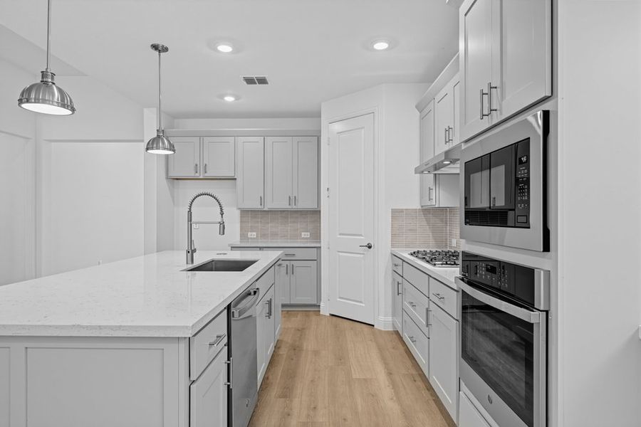 Furnished interior view inside a new home in South Oak, Lakewood Village (Image 7).