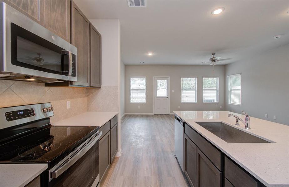 Island kitchen with counter seating