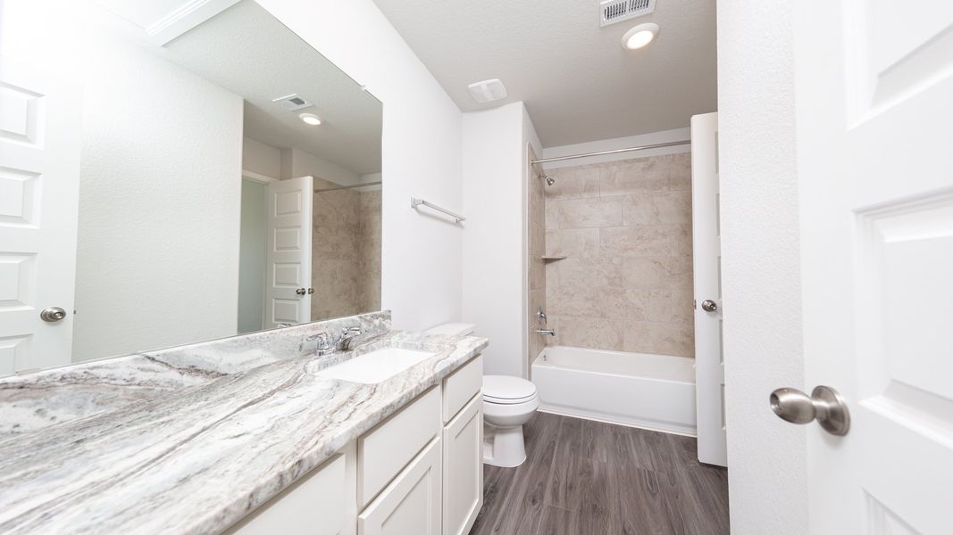 Representative furnished interior of a home built from the The Landry by Legend Homes in Cinco Lakes, San Antonio (Image 11).