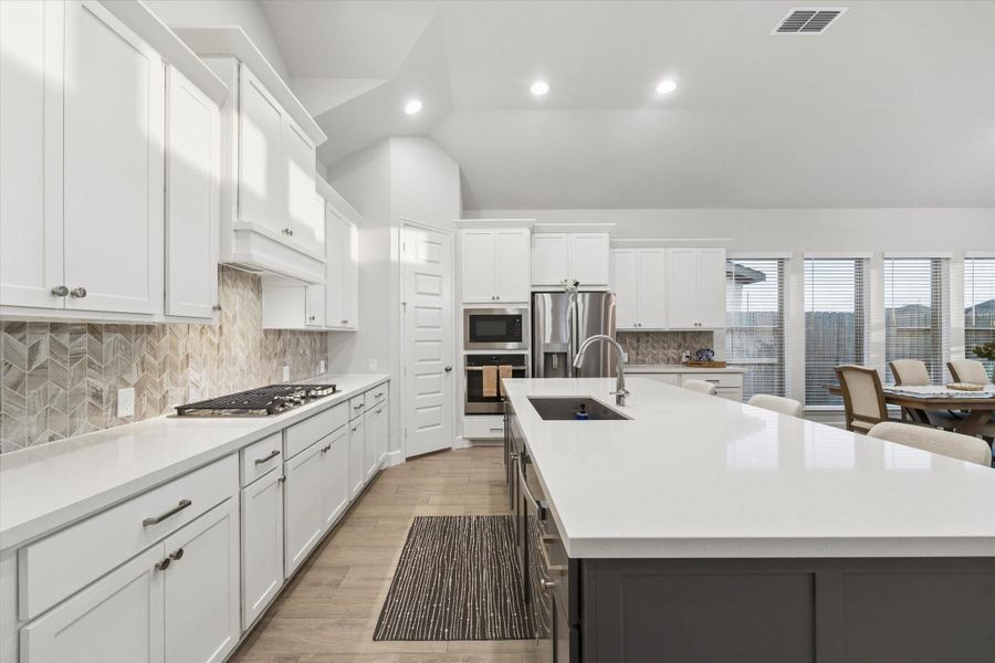 Furnished interior view inside a new home in Sienna, Missouri City (Image 18).