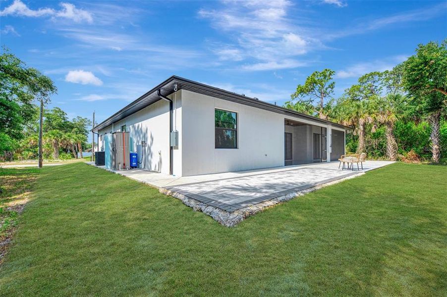 Exterior details and patio area of a home in , North Port (Image 39).