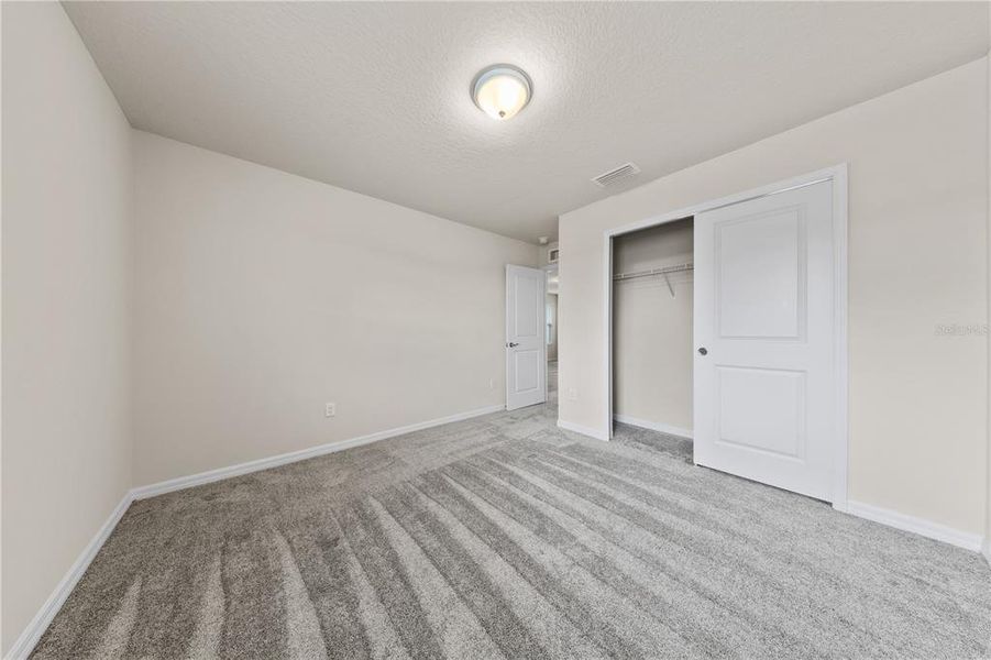 Spacious, unfurnished interior of a new home in EverBe, Orlando (Image 16).