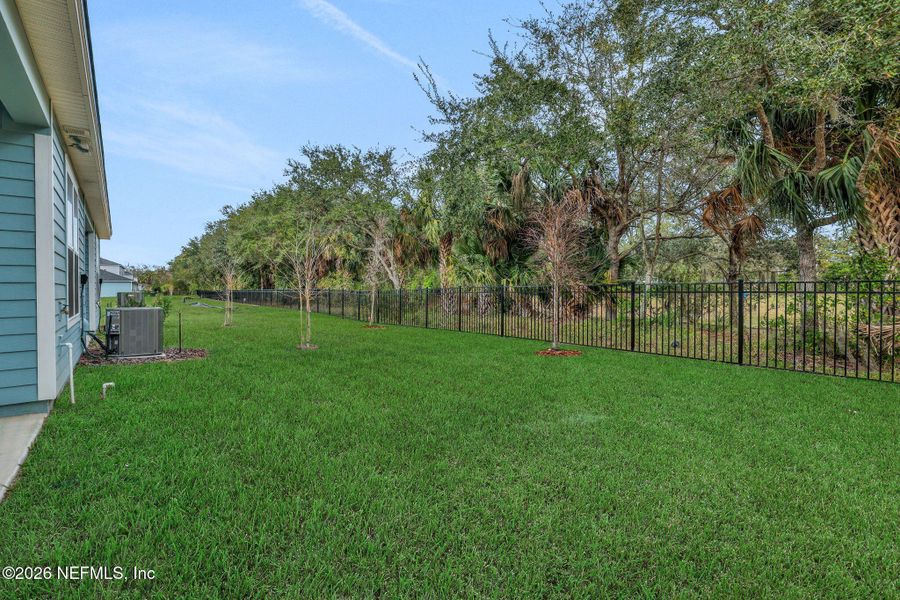 Exterior details and patio area of a home in The Hammock at Palm Harbor, Palm Coast (Image 24).