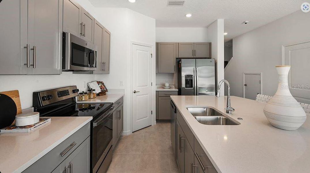 Furnished interior view inside a new home in The Townhomes at Azario Lakewood Ranch, Bradenton (Image 6).