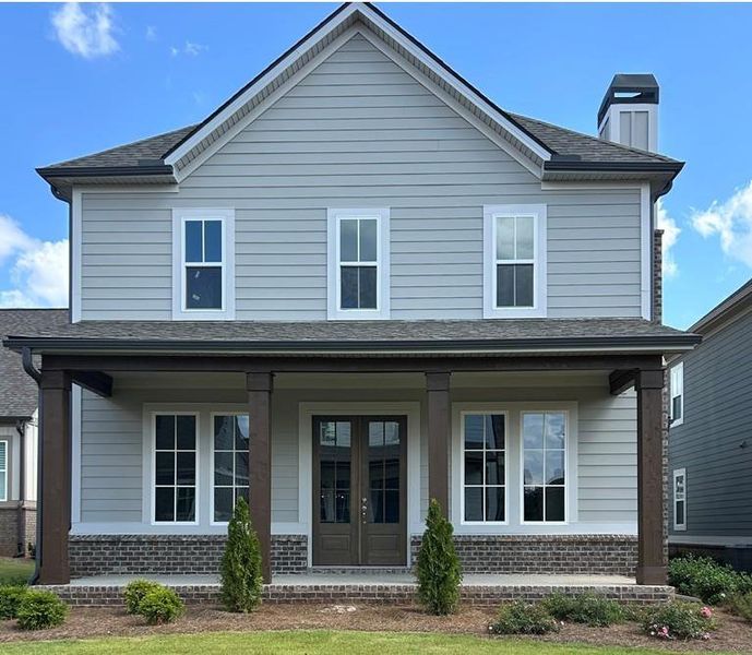 Front exterior of a new home in Trove, Watkinsville, GA, highlighting curb appeal (Image 2). Front exterior of a new home in Trove, Watkinsville, GA, highlighting curb appeal (Image 2).