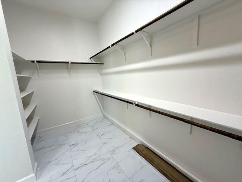 Large walk in closet at master