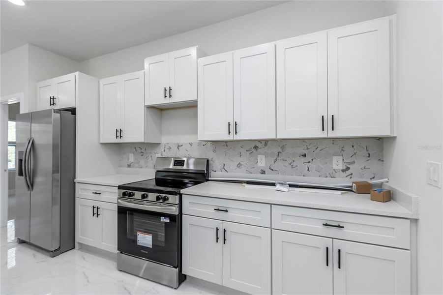 Furnished interior view inside a new home in , Ocala (Image 9).