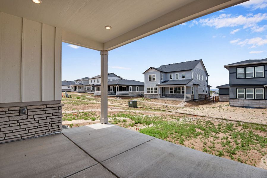 Exterior details and patio area of a home in The Aurora Highlands, Aurora (Image 22).