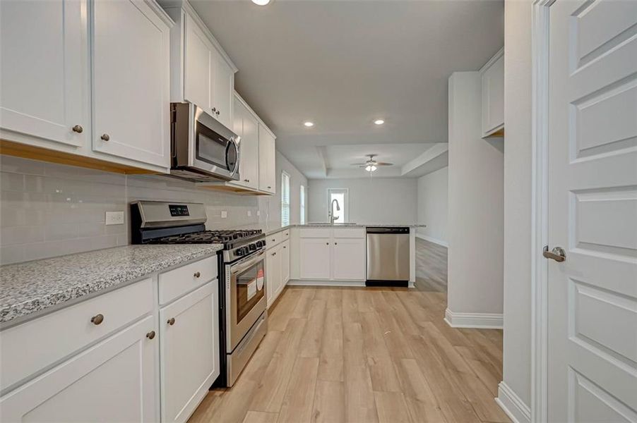 Furnished interior view inside a new home in Parkland Place, Pace (Image 3).