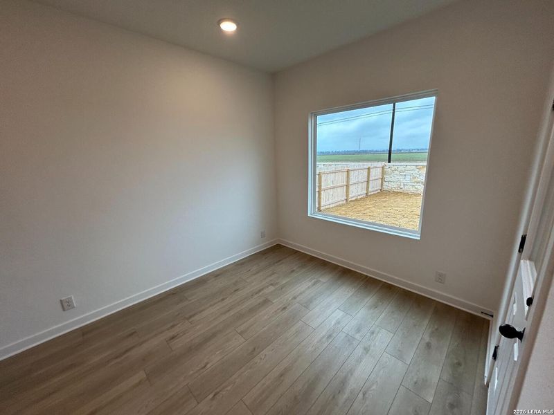 Spacious, unfurnished interior of a new home in Hennersby Hollow, San Antonio (Image 16).