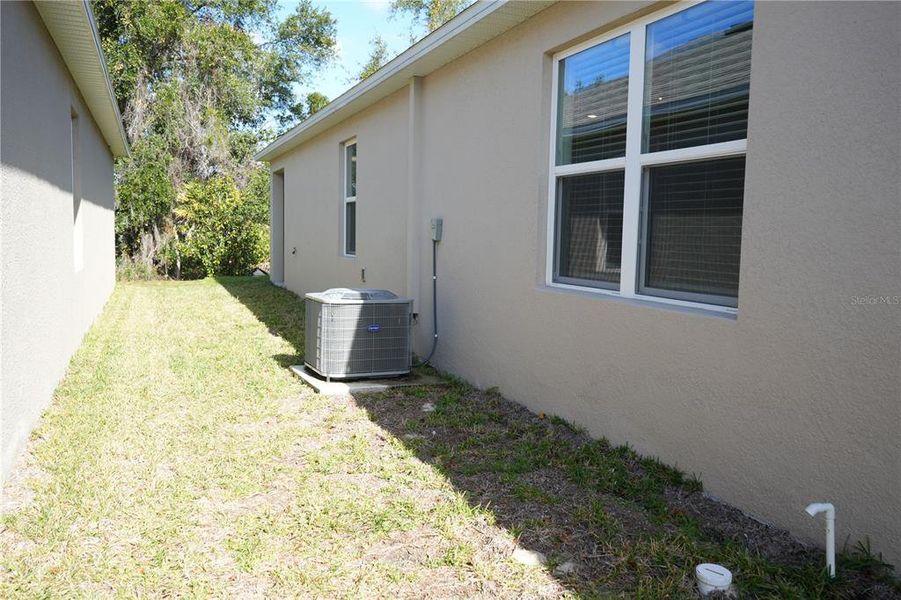 Exterior details and patio area of a home in Cadence at Parc Hill, Orange City (Image 20).