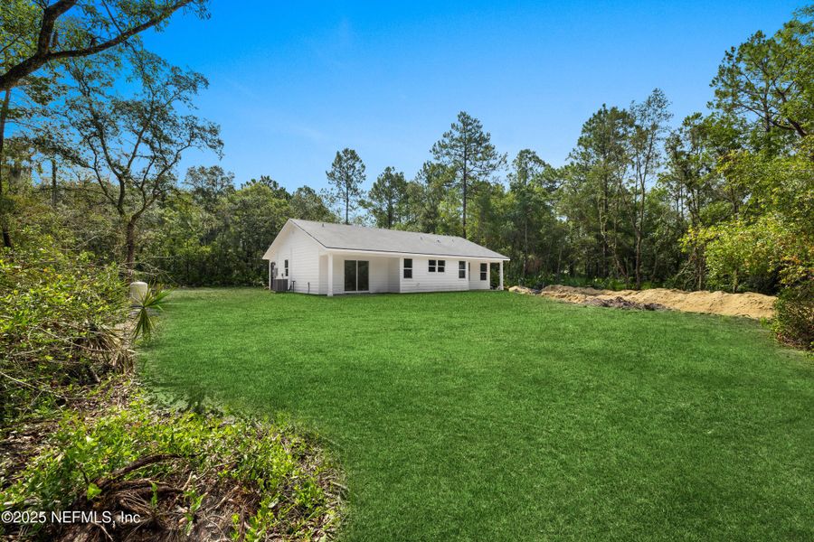 Front exterior of a new home in , Crescent City, FL, highlighting curb appeal (Image 2).