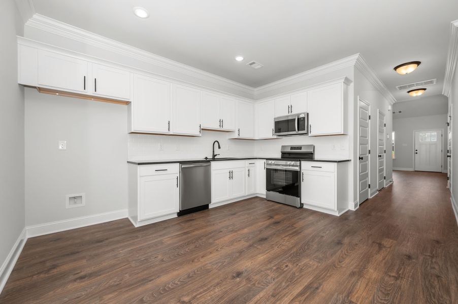 Front exterior of a new home in Saddlebrook, Murfreesboro, TN, highlighting curb appeal (Image 2).