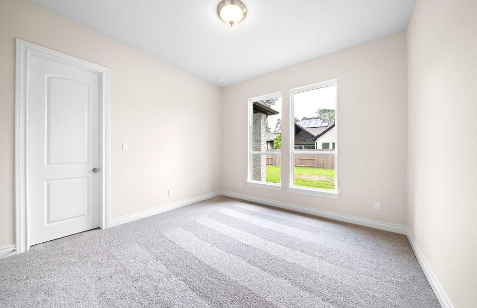 Representative unfurnished interior of a home built from the 4094 by Ravenna Homes in Artavia 70′, Conroe (Image 59).