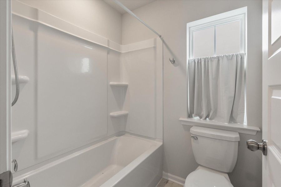 Furnished interior view inside a new home in Sweetgrass at Summers Corner, Summerville (Image 36).