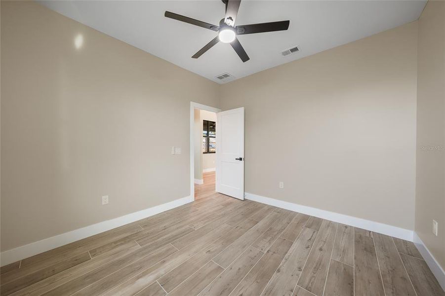 Spacious, unfurnished interior of a new home in , Port Charlotte (Image 16).