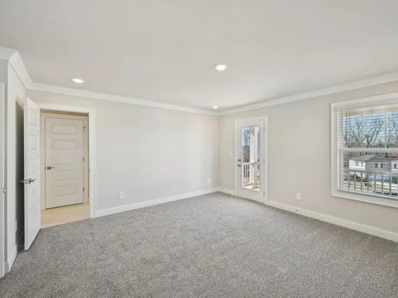 Spacious, unfurnished interior of a new home in Martin Springs - Cottage Series, Lawrenceville (Image 15).