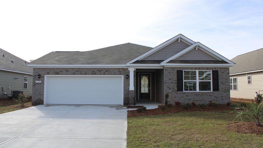 Representative exterior photo of a completed home built from the Litchfield by D.R. Horton in The Bluffs at Mill Creek, Florence, SC (Image 22).