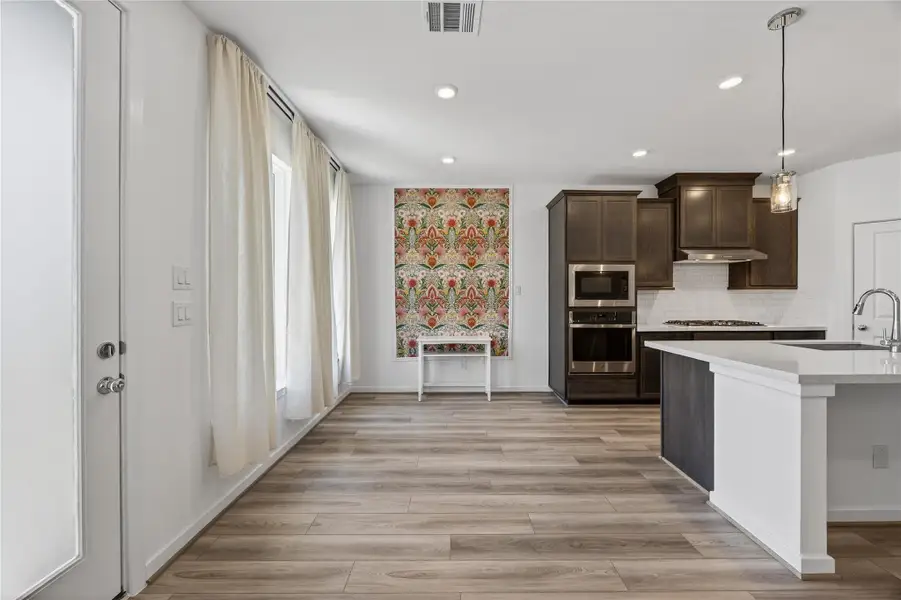 Furnished interior view inside a new home in Trillium, Richmond (Image 10).